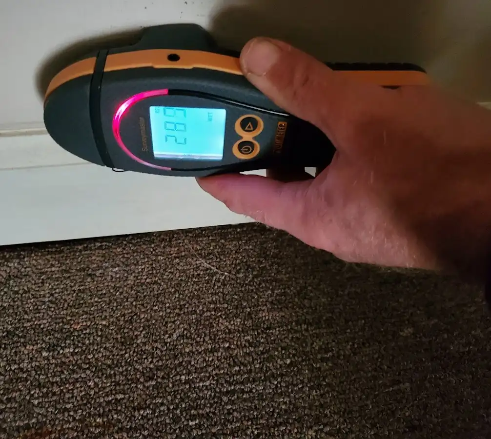 Moisture detection at baseboard during Burst Pipe Cleanup in State College